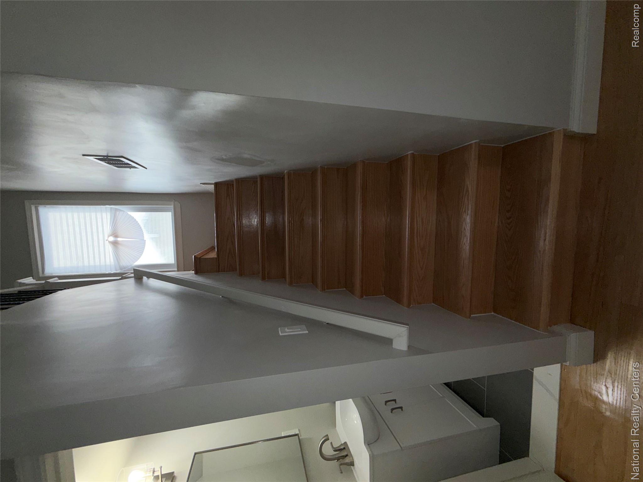 16522 Inverness Street Detroit, MI 48221 - Photo 23 of 62 Stairs featuring wood finished floors