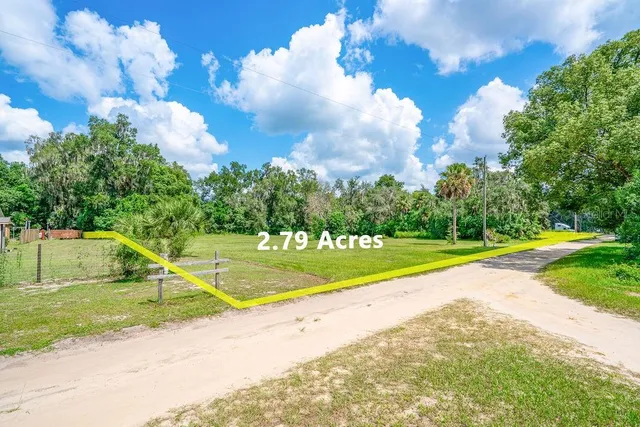 a view of a playground with basketball court