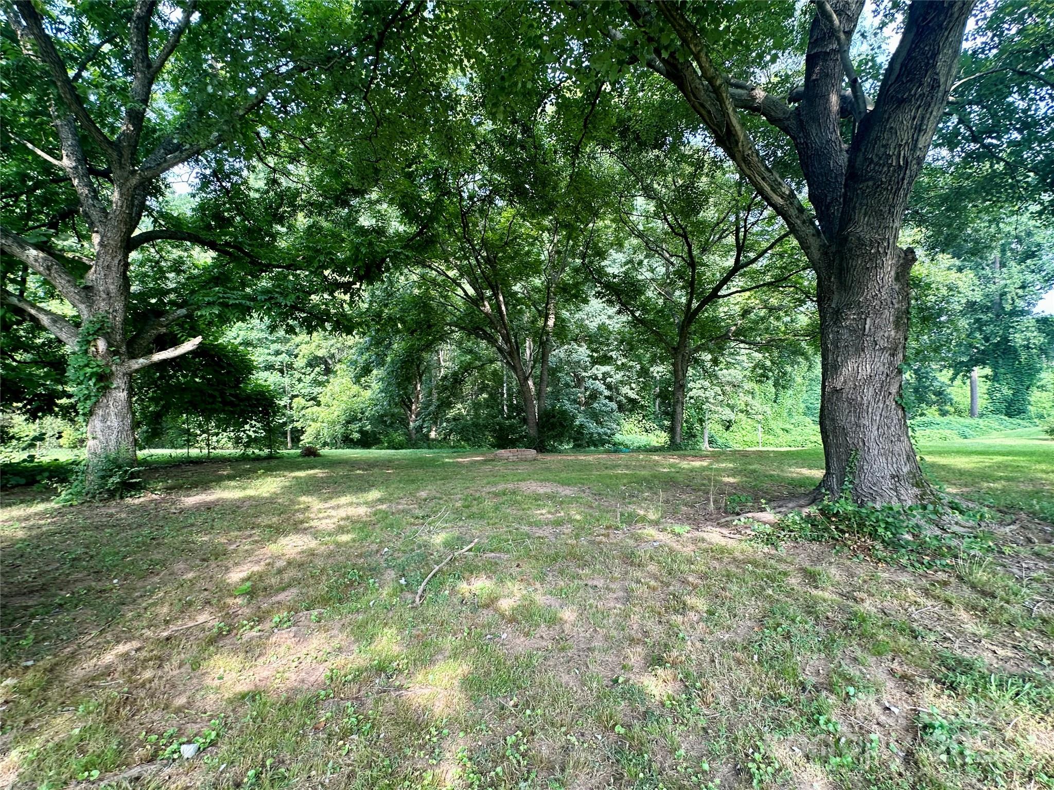128 Market Road Mooresville, NC 28115 - Photo 7 of 20 a view of outdoor space with trees