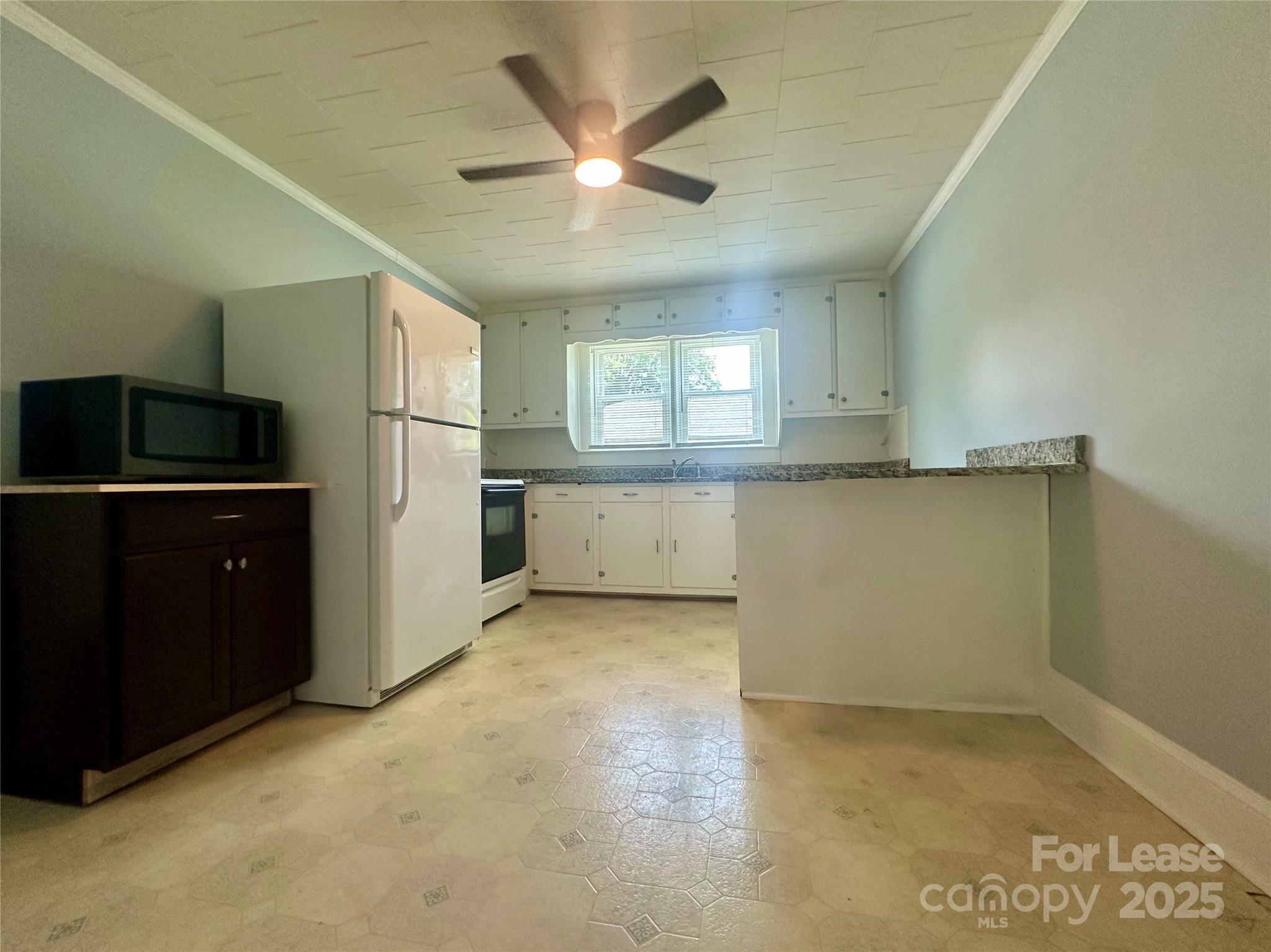 128 Market Road Mooresville, NC 28115 - Photo 8 of 20 an empty room with closet and windows