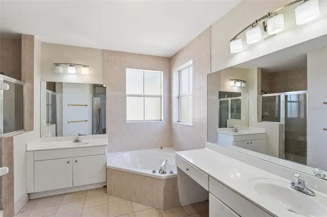 a bathroom with a toilet and a bathtub