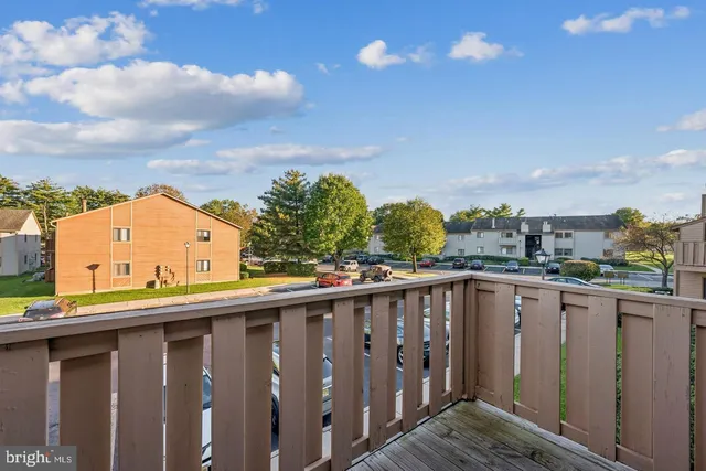 a view of a street from a balcony