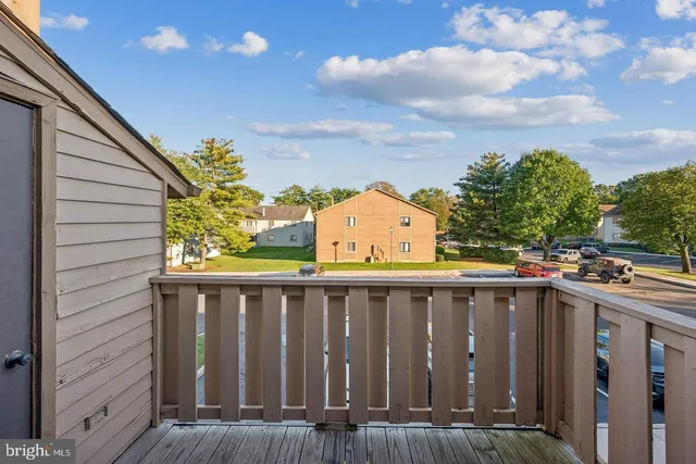 a view of a wooden fence