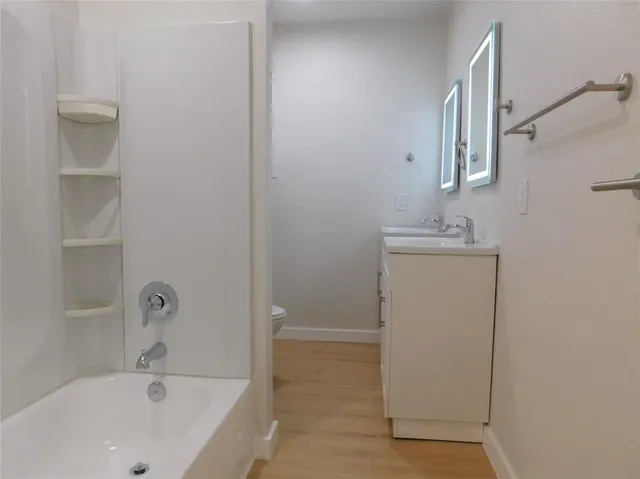 a view of a house with backyard