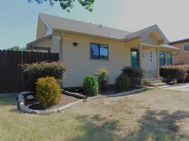 a vase of flowers sitting on a table