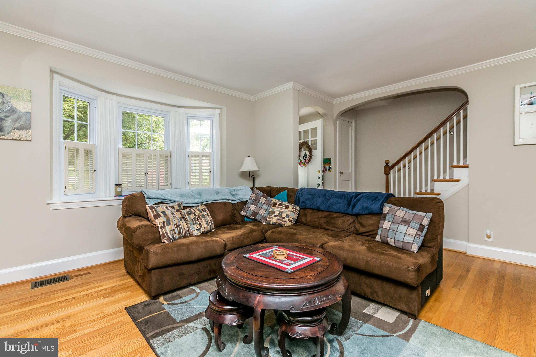 215 Dumbarton Road Baltimore, MD 21212 - Photo 2 of 30 a living room with furniture and a window