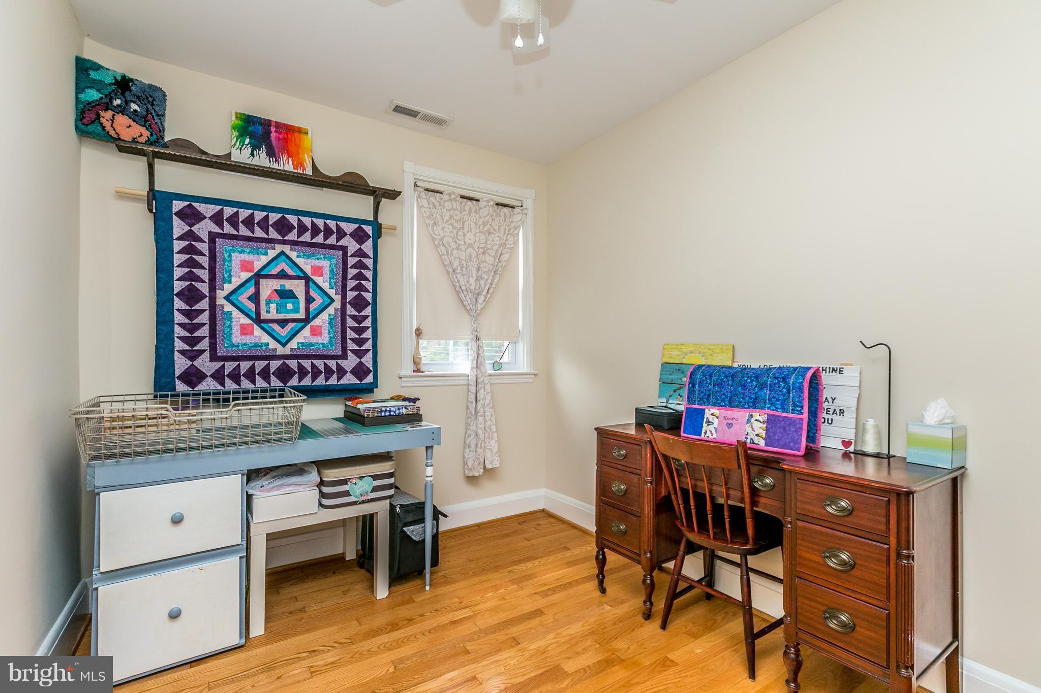 215 Dumbarton Road Baltimore, MD 21212 - Photo 12 of 30 a view of a workspace with furniture