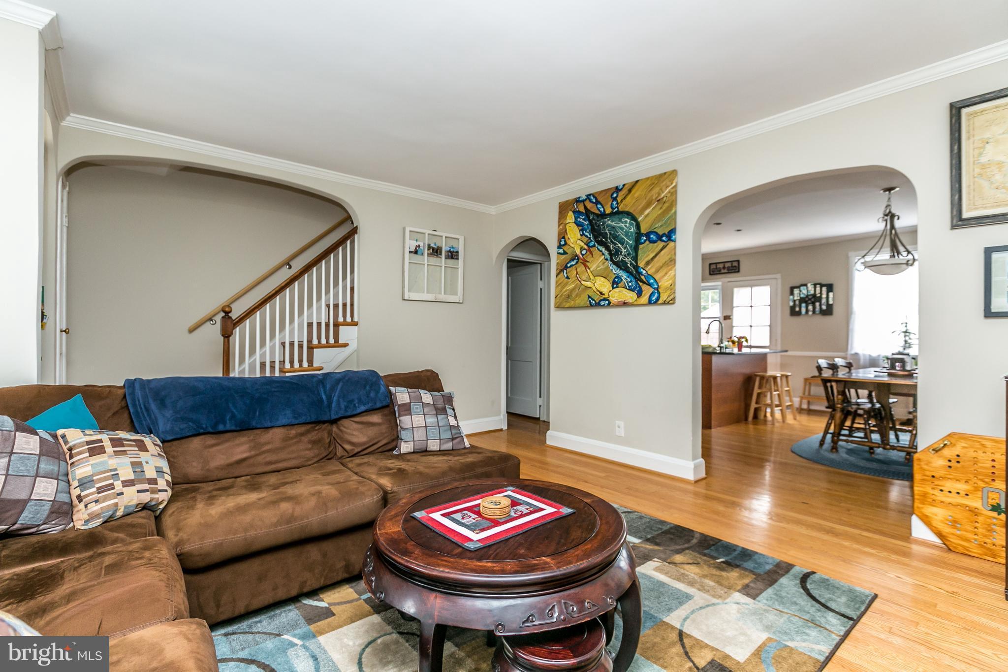 215 Dumbarton Road Baltimore, MD 21212 - Photo 3 of 30 a living room with furniture and a wooden floor