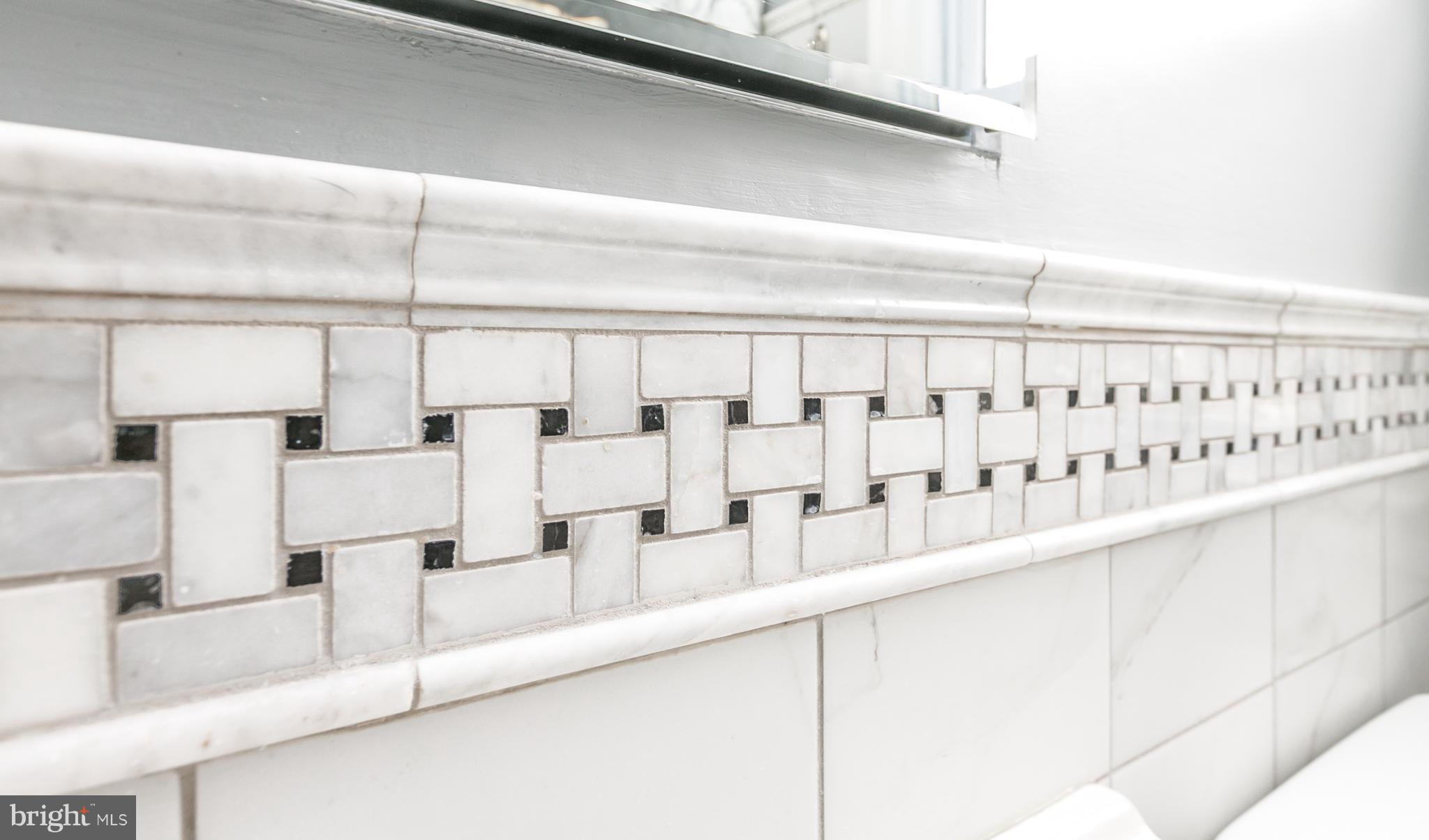 215 Dumbarton Road Baltimore, MD 21212 - Photo 22 of 30 a close view of kitchen sink with white cabinets
