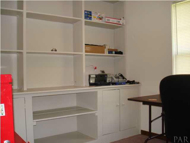 6601 Bellview Pines Road Pensacola, FL 32526 - Photo 7 of 15 Built in bookcase in back bedroom.