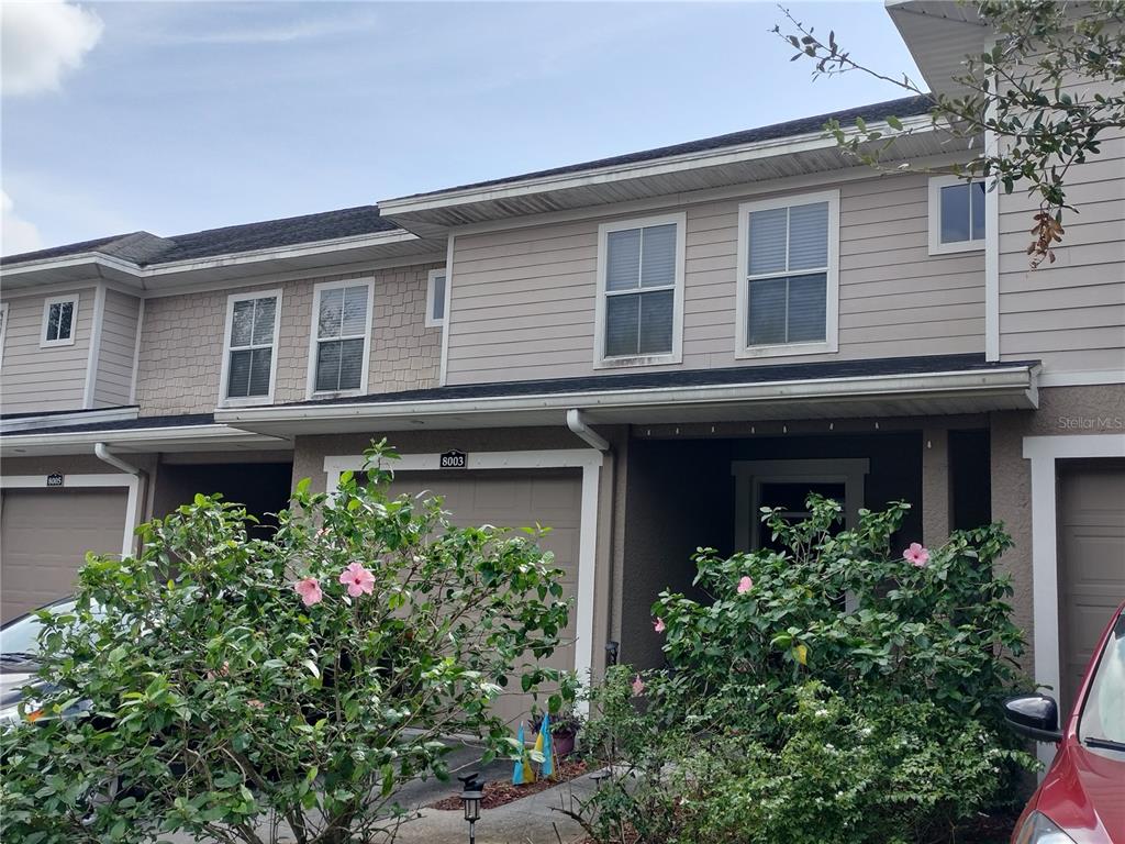 8003 Bally Money Road Tampa, FL 33610 - Photo 1 of 1 a house view with a garden space