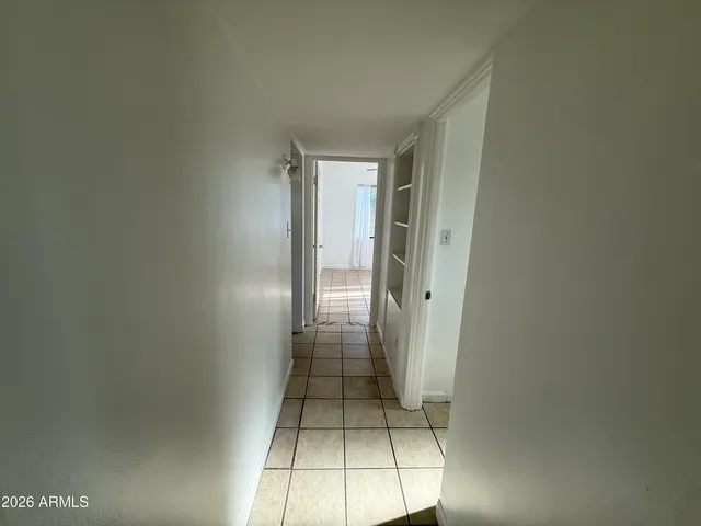 a view of entryway with bathroom