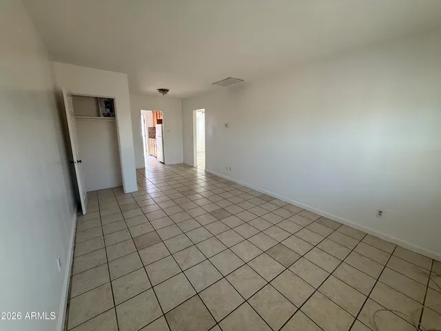a view of an empty room and window