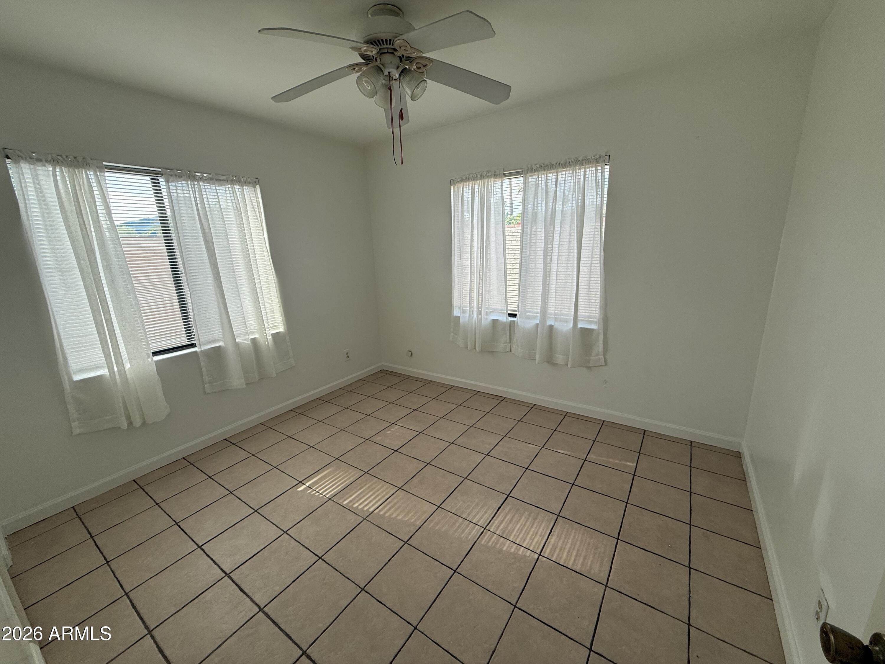 1801 North 7th Avenue Phoenix, AZ 85003 - Photo 10 of 14 a view of an empty room and window
