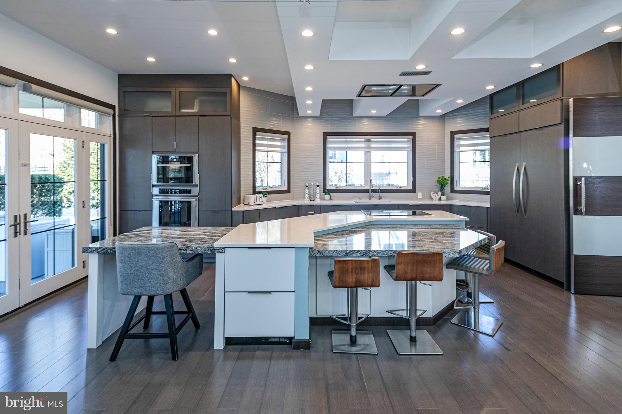 31 Westerly Road Princeton, NJ 08540 - Photo 14 of 47 a kitchen with a table chairs refrigerator and window