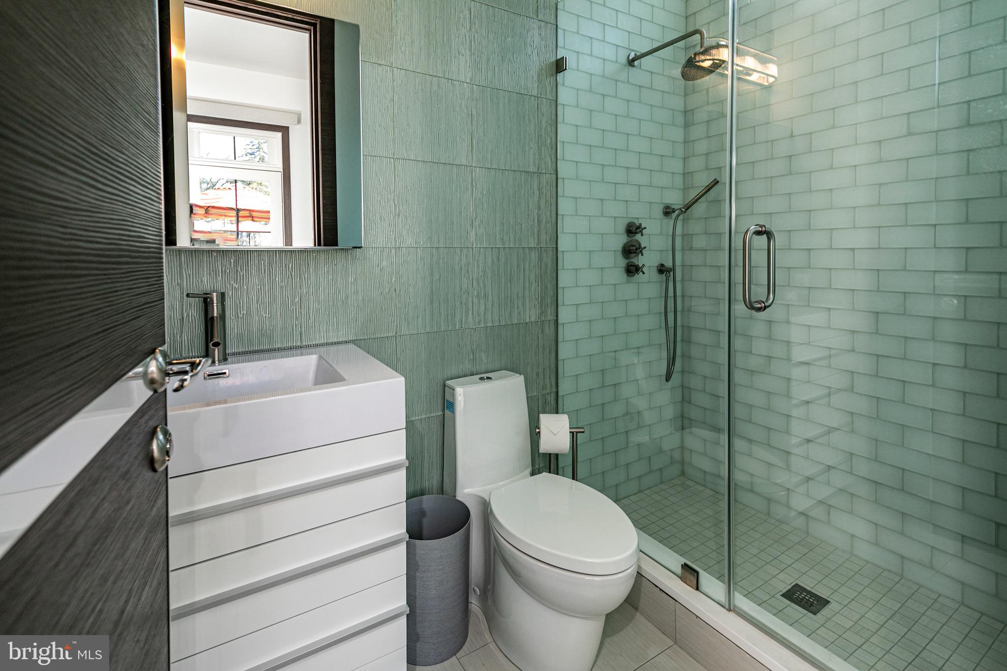 31 Westerly Road Princeton, NJ 08540 - Photo 20 of 47 a bathroom with a sink toilet and shower