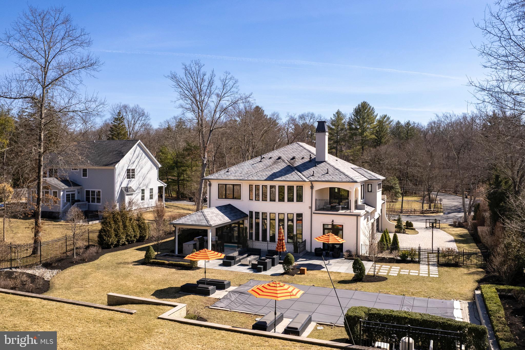 31 Westerly Road Princeton, NJ 08540 - Photo 2 of 47 a view of a big house with swimming pool and sitting area