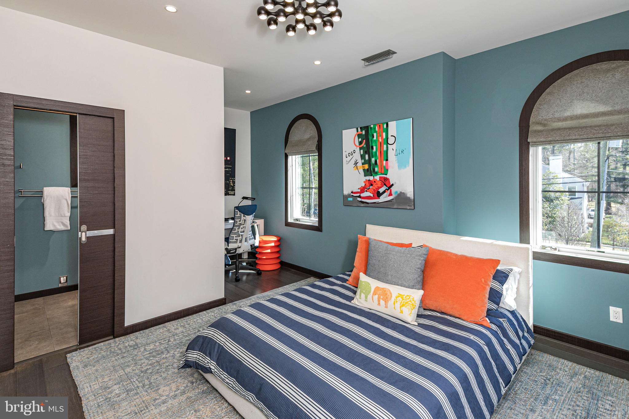 31 Westerly Road Princeton, NJ 08540 - Photo 29 of 47 a bedroom with a bed and a painting on the wall