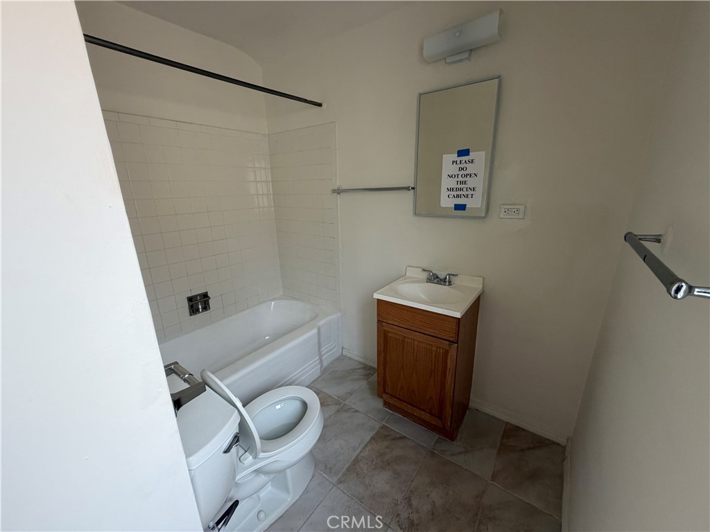 118 Fano Street, Unit 1/2 Arcadia, CA 91006 - Photo 4 of 4 a bathroom with a toilet a sink and a shower