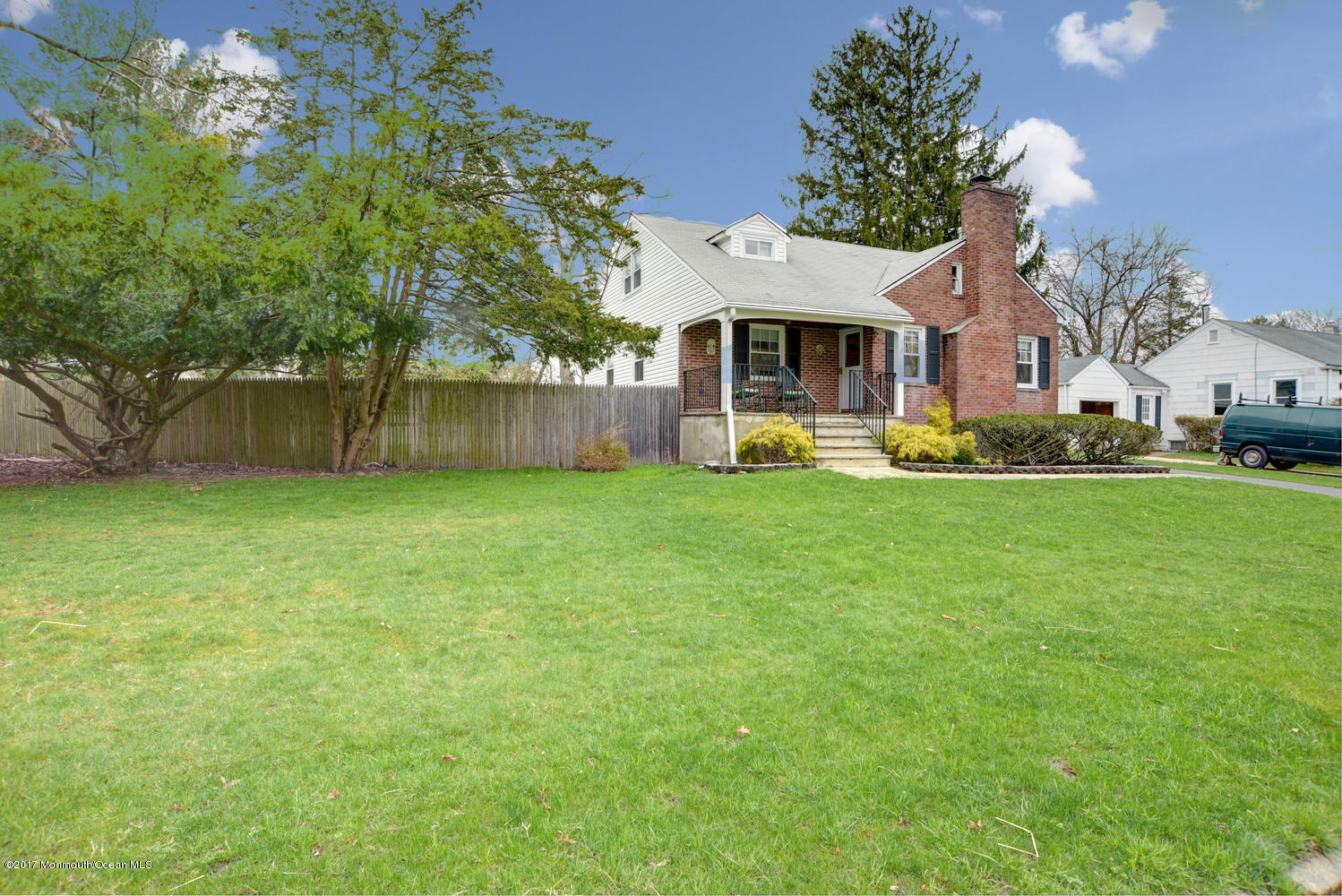 123 Robin Road Neptune Township, NJ 07753 - Photo 1 of 28 a front view of house with yard and trees