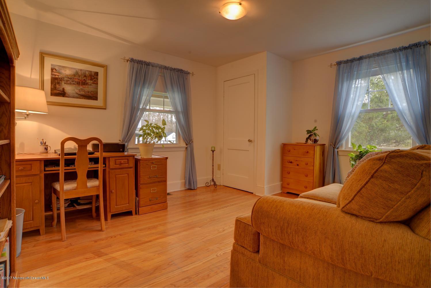 123 Robin Road Neptune Township, NJ 07753 - Photo 14 of 28 a bedroom with furniture and a window