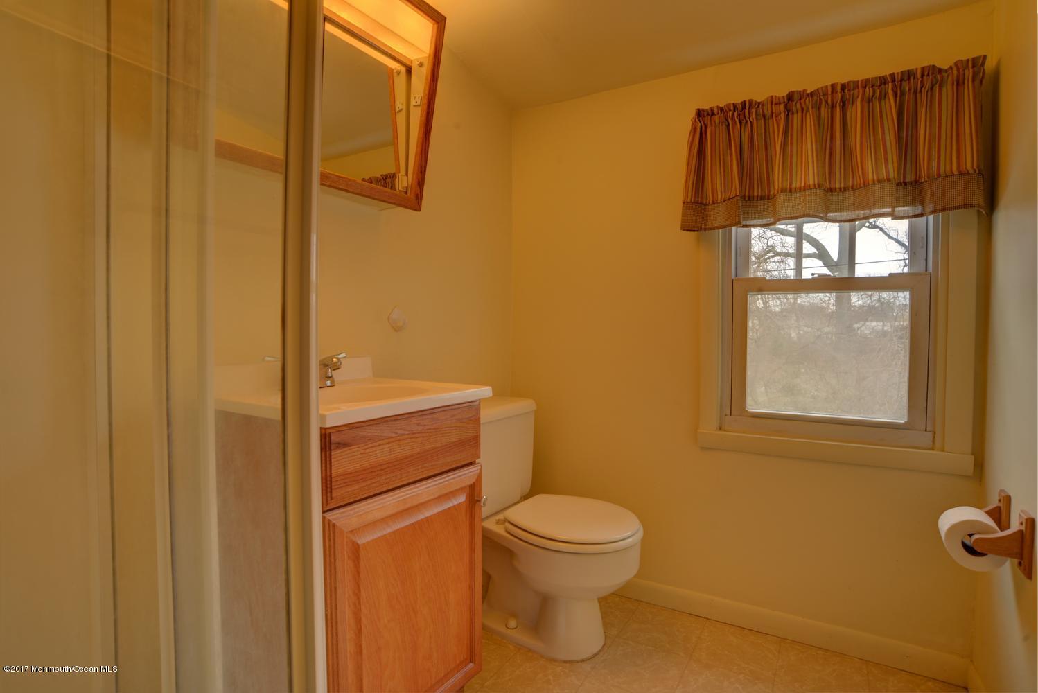 123 Robin Road Neptune Township, NJ 07753 - Photo 19 of 28 a bathroom with a toilet