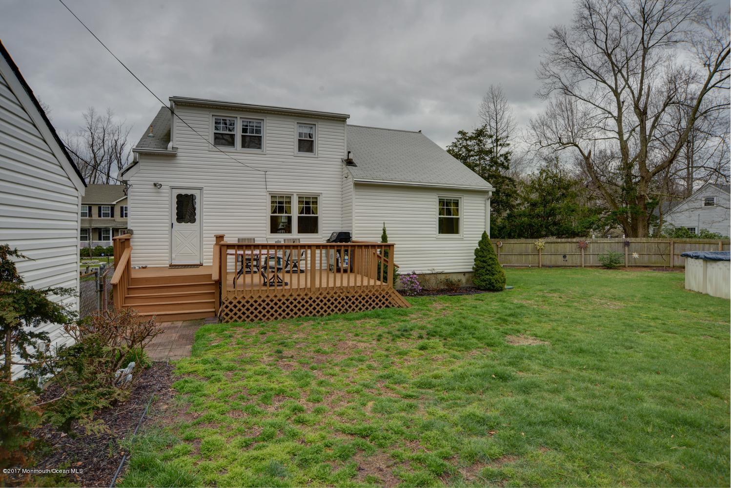 123 Robin Road Neptune Township, NJ 07753 - Photo 27 of 28 a view of a house with a yard and sitting area