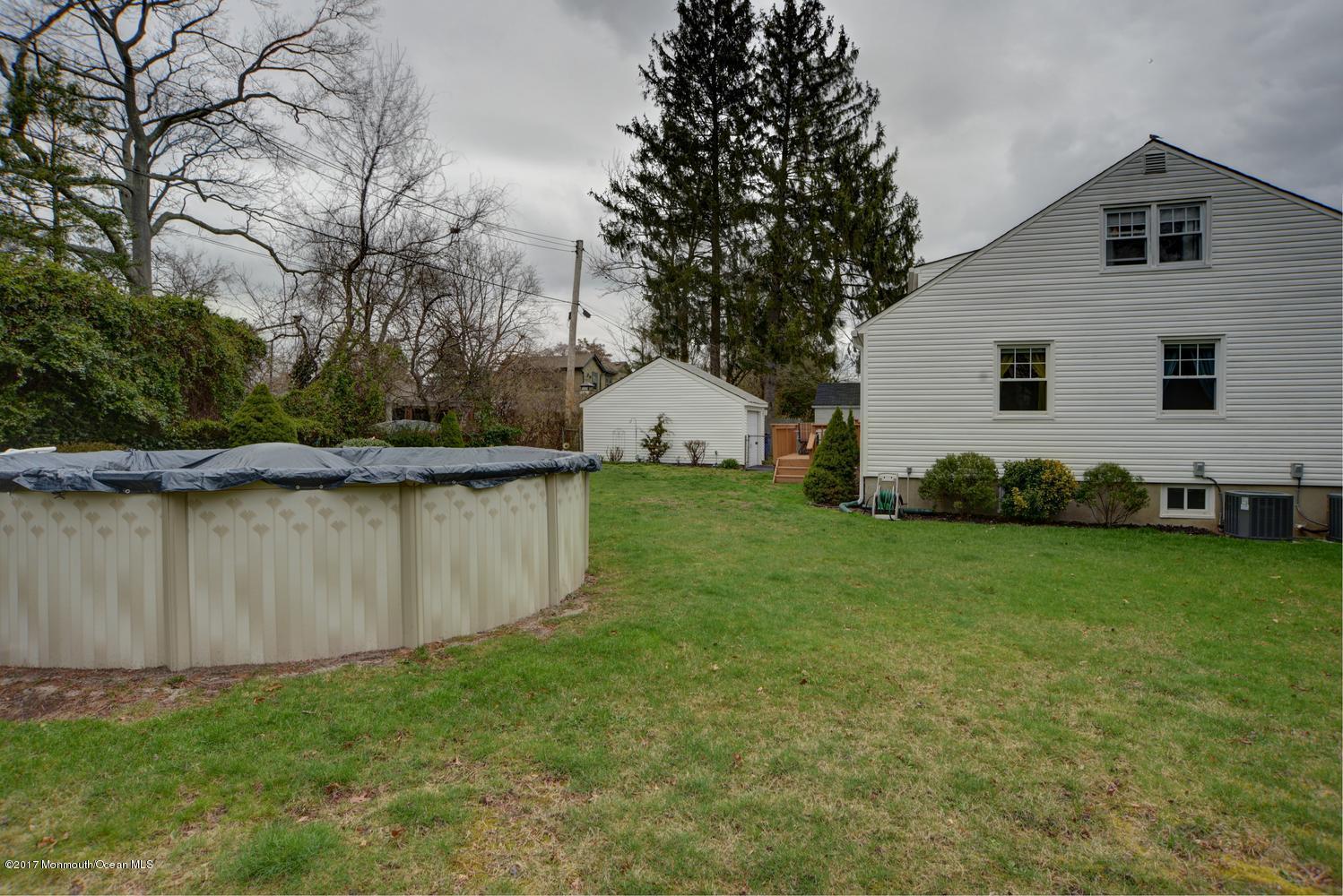 123 Robin Road Neptune Township, NJ 07753 - Photo 28 of 28 a view of a backyard with potted plants and large trees