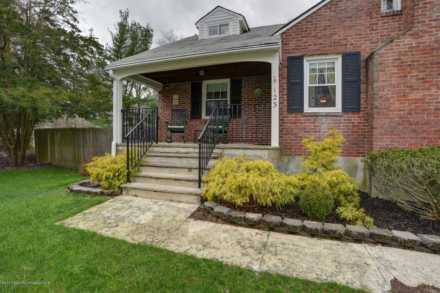 123 Robin Road Neptune Township, NJ 07753 - Photo 4 of 28 a view of a house with sitting area and garden