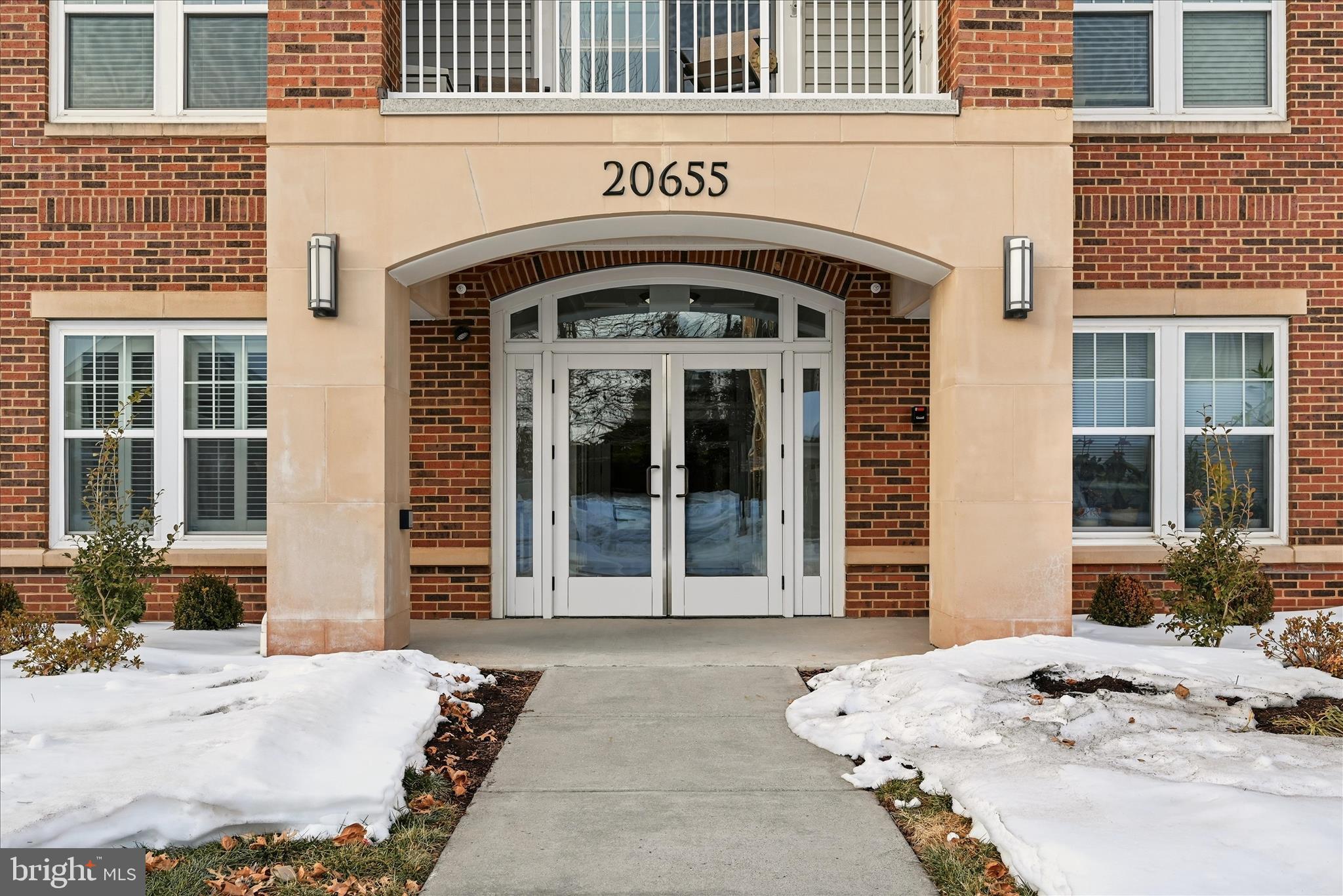 20655 Hope Spring Terrace, Unit 104 Ashburn, VA 20147 - Photo 2 of 40 Front Exterior Entrance