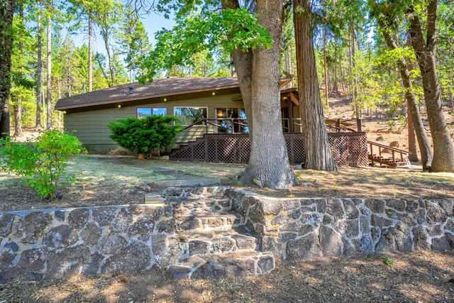 a view of a swimming pool with an outdoor space and seating area
