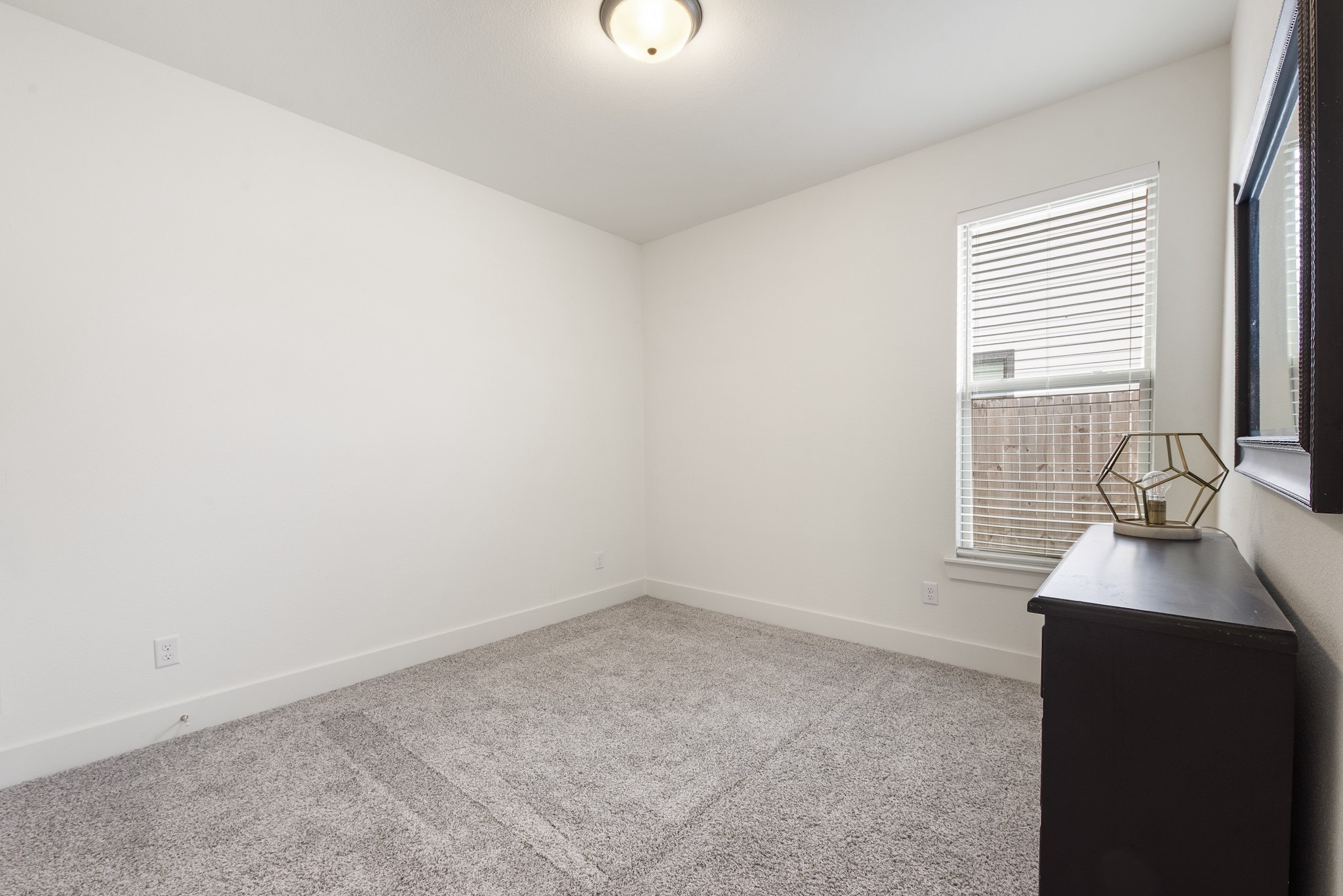 424 Brazos Bend Snook, TX 77879 - Photo 18 of 23 a room with a sink and a window