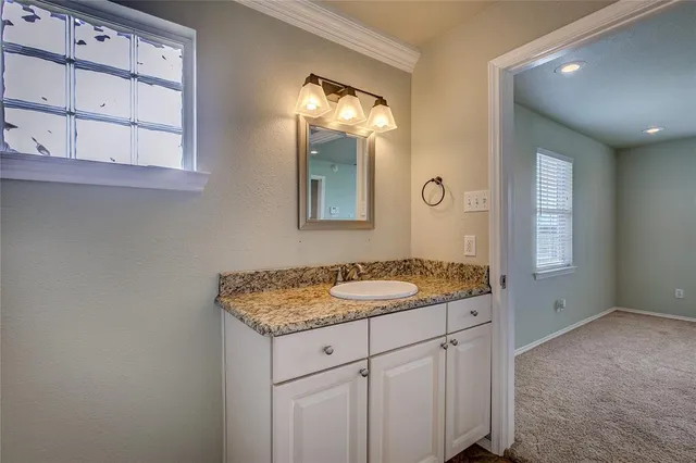 a view of a house with a yard and garage