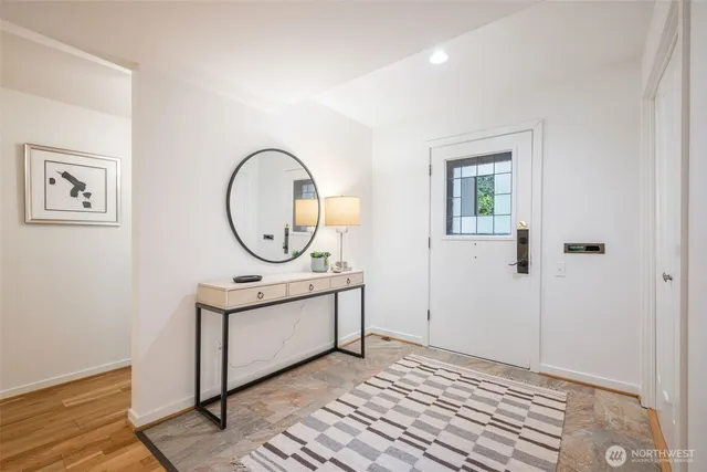 a area with wooden floor and window