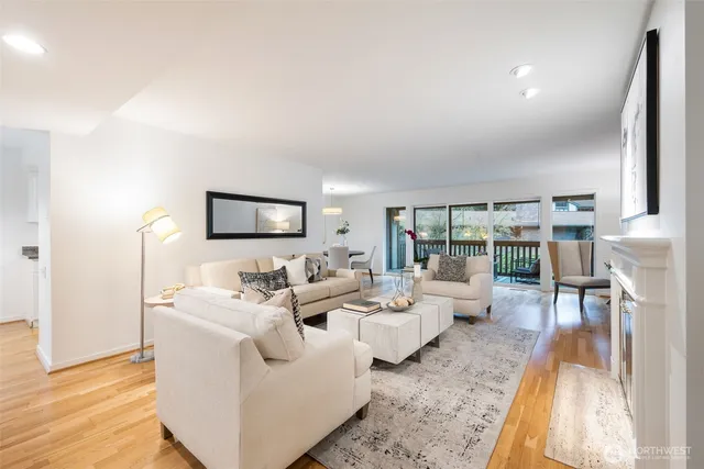 a living room with furniture and a table