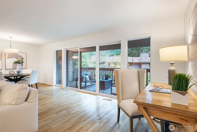 a workspace with furniture and a window