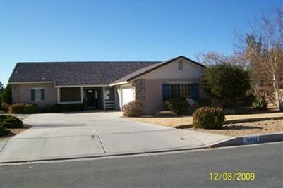 13090 Choco Road Apple Valley, CA 92308 - Photo 1 of 1 a house view with a outdoor space
