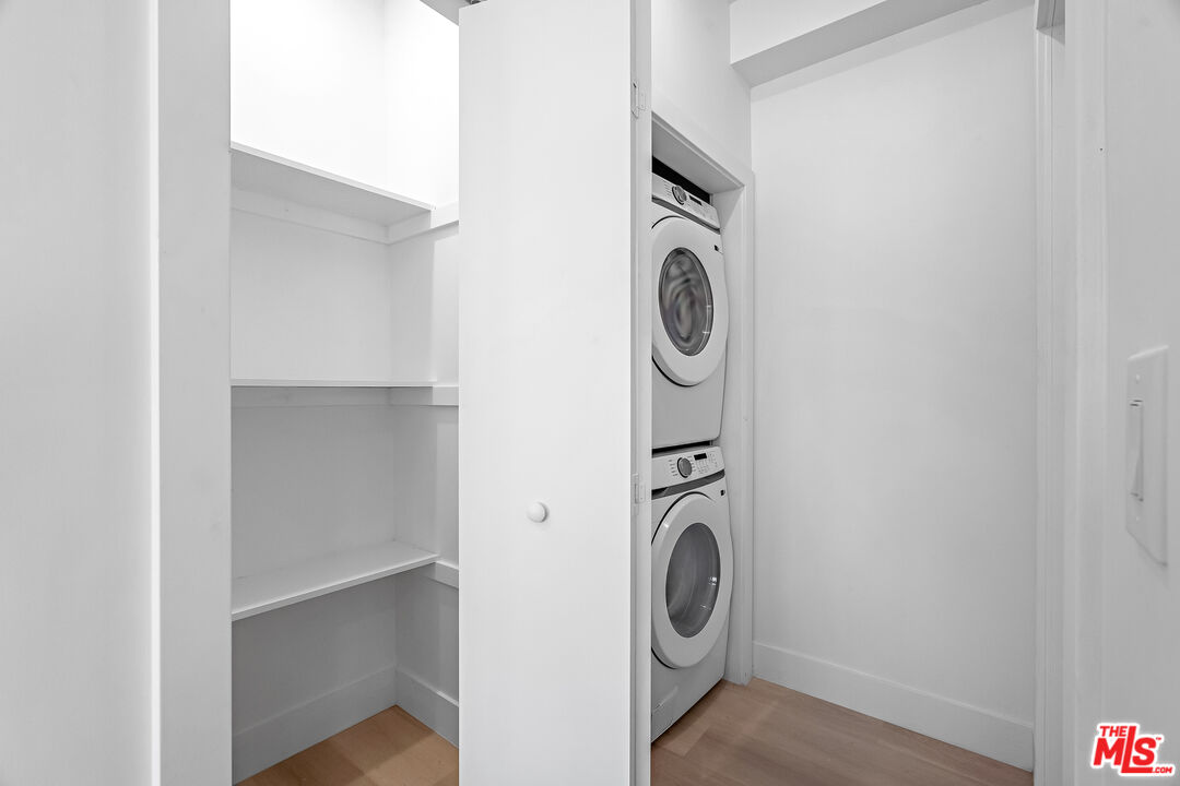 5832 David Avenue, Unit 1 Los Angeles, CA 90034 - Photo 17 of 44 a utility room with dryer and washer