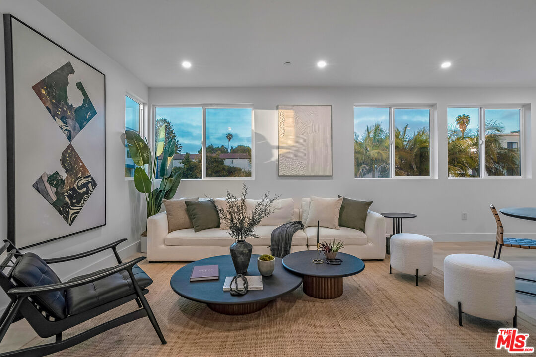 5832 David Avenue, Unit 1 Los Angeles, CA 90034 - Photo 37 of 44 a living room with furniture and a potted plant