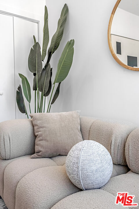 5832 David Avenue, Unit 1 Los Angeles, CA 90034 - Photo 8 of 44 a living room with furniture and a potted plant