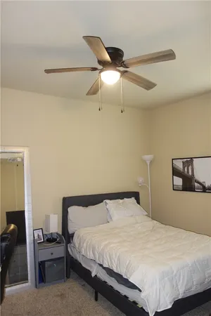 a backyard of a house with outdoor seating