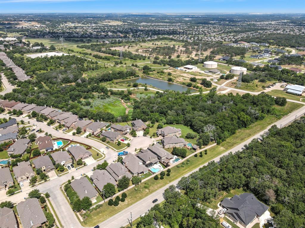 Tbd23 Copper Canyon Road Argyle, TX 76226 - Photo 11 of 17 an aerial view of residential houses with outdoor space