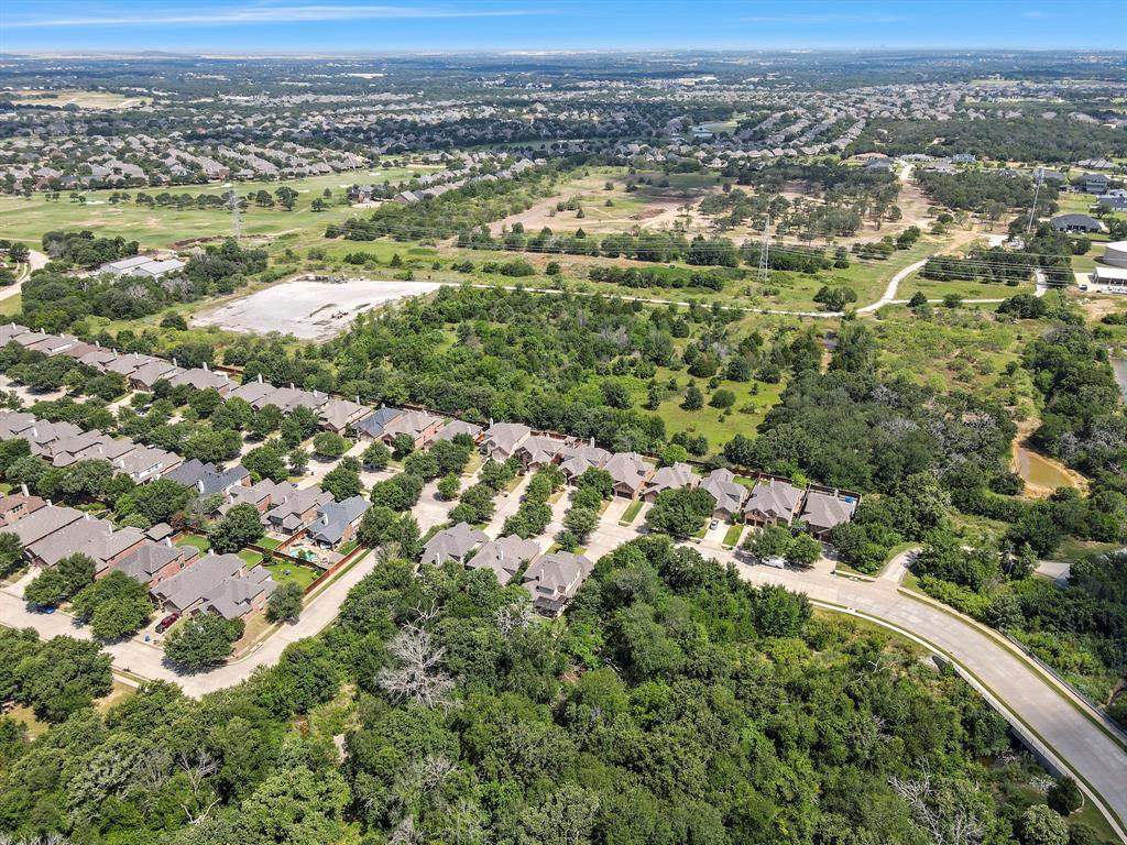 Tbd23 Copper Canyon Road Argyle, TX 76226 - Photo 14 of 17 an aerial view of residential houses with outdoor space and trees