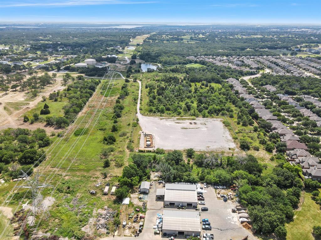 Tbd23 Copper Canyon Road Argyle, TX 76226 - Photo 6 of 17 an aerial view of a residential houses with city view