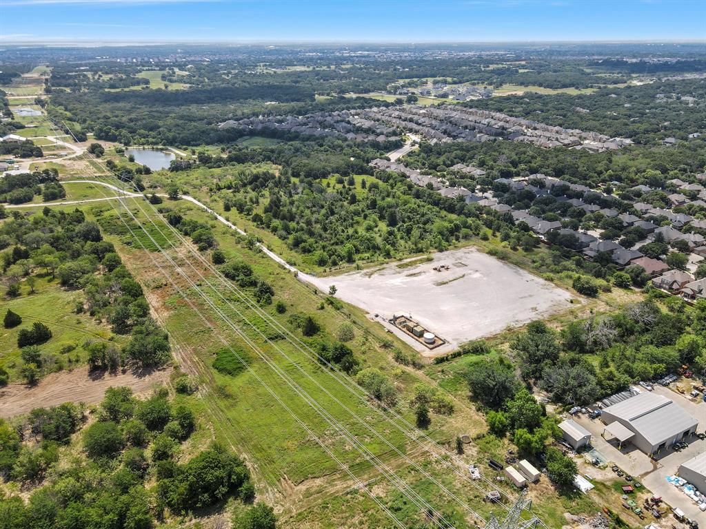 Tbd23 Copper Canyon Road Argyle, TX 76226 - Photo 8 of 17 an aerial view of residential houses with outdoor space