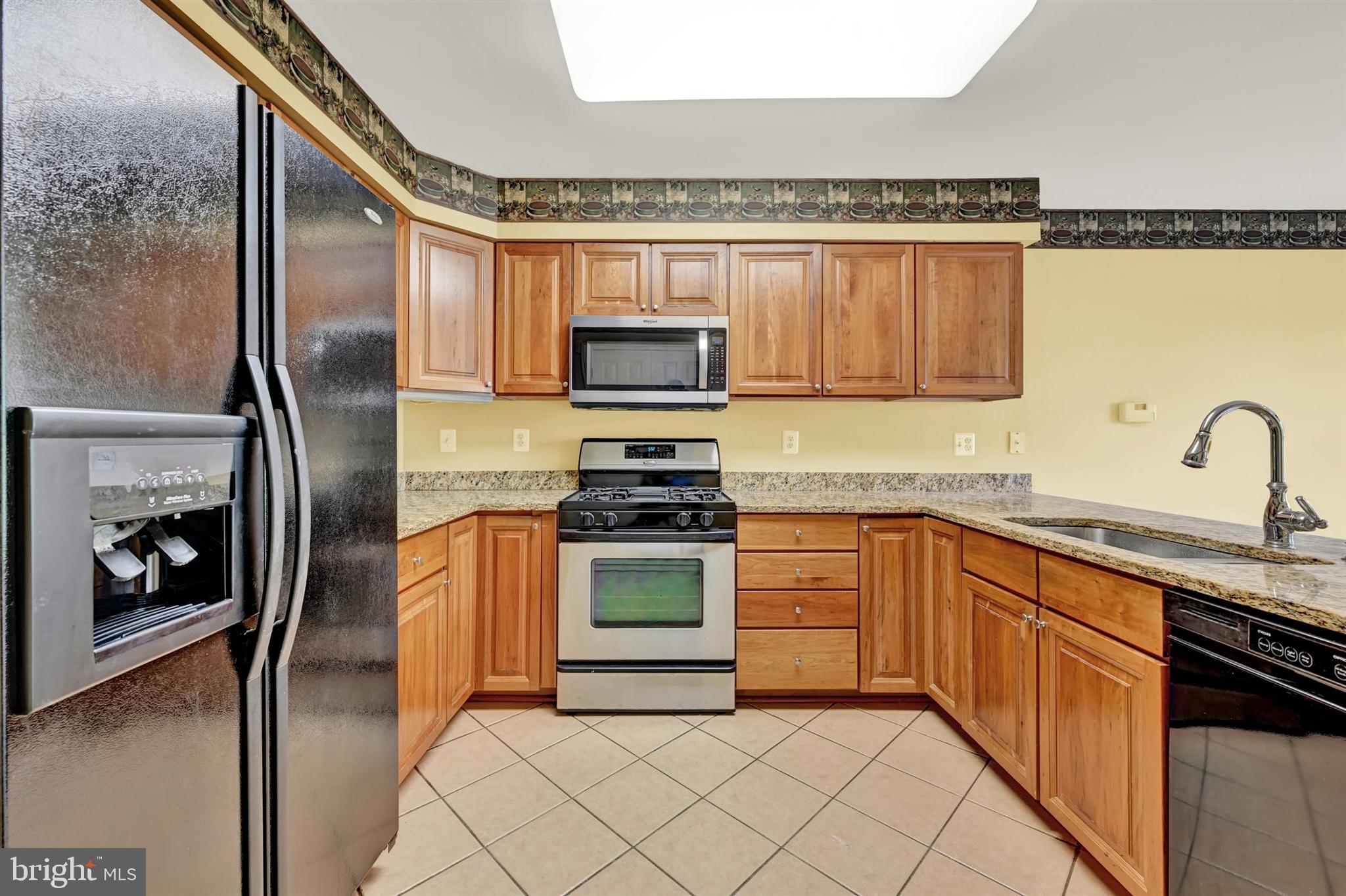 12021 Tralee Road, Unit 402 Lutherville-Timonium, MD 21093 - Photo 13 of 36 Kitchen