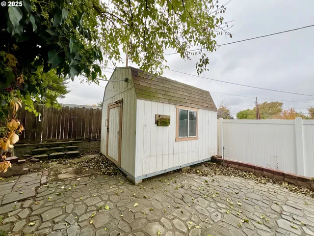 a house view with a backyard