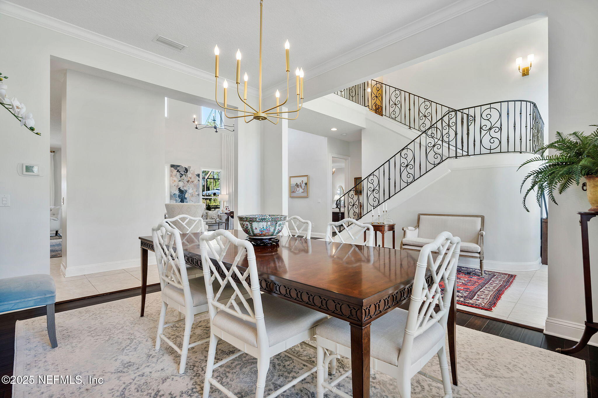 139 Foxcraft Street St. Augustine, FL 32092 - Photo 11 of 93 a view of a dining room with furniture and a chandelier