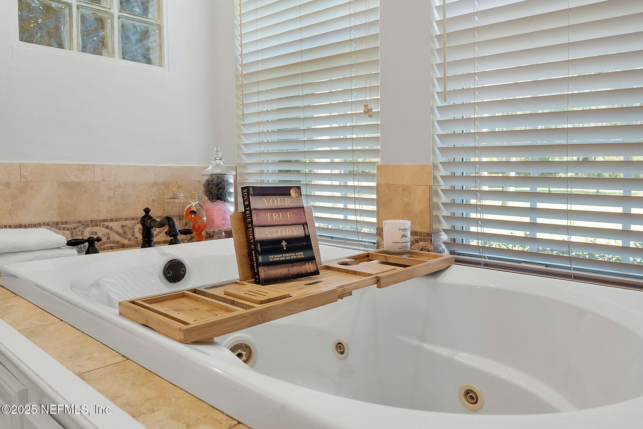 139 Foxcraft Street St. Augustine, FL 32092 - Photo 44 of 93 a white bath tub sitting next to a window