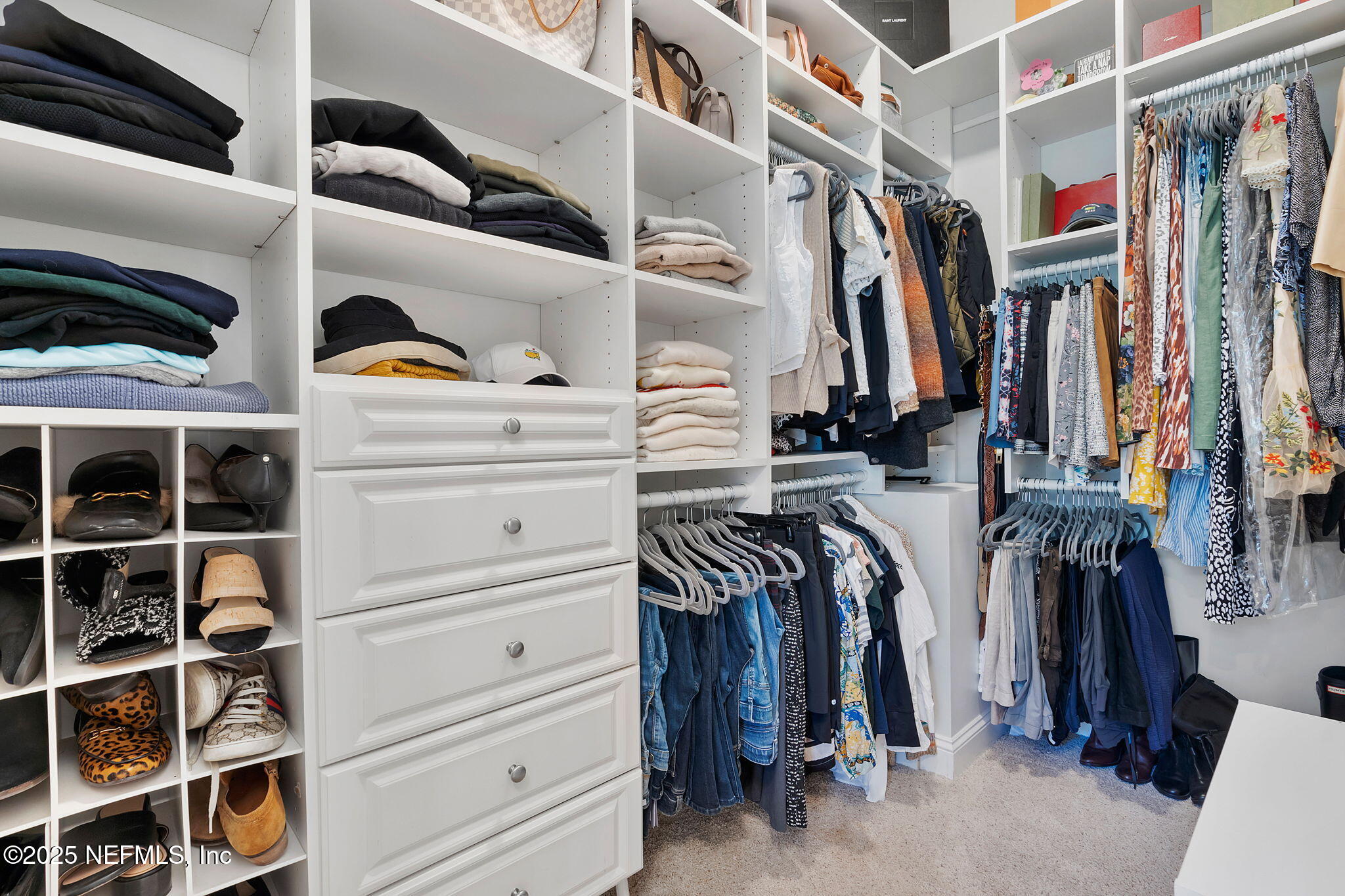 139 Foxcraft Street St. Augustine, FL 32092 - Photo 48 of 93 a view of walk in closet with clothes and shoes